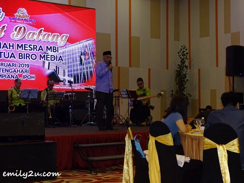  6. one of the City Councillors signs a Japanese song