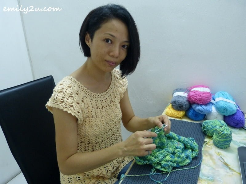 Samantha knitting a blouse with interchangeable circular knitting needles