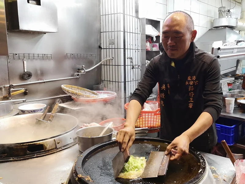 frying oyster omelette