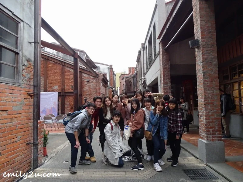 graduating students pose for a group photo