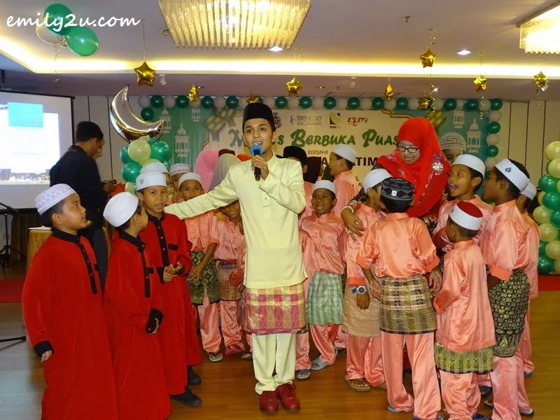  Aiman Tino with some of the orphans