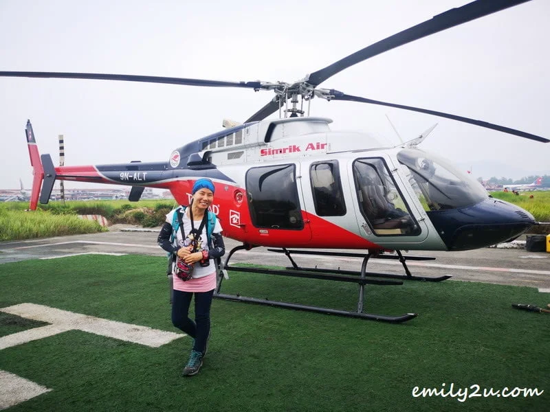 about to fly in Simrik Air's Bell 407 to Manaslu Conservation Area