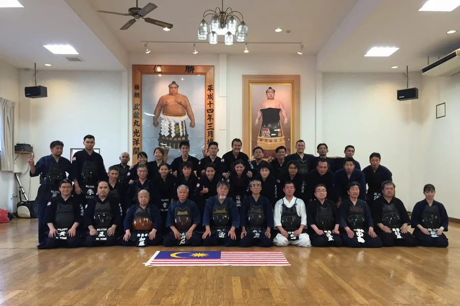 group photo with members of the Chichibu Kendo Association after a joint training