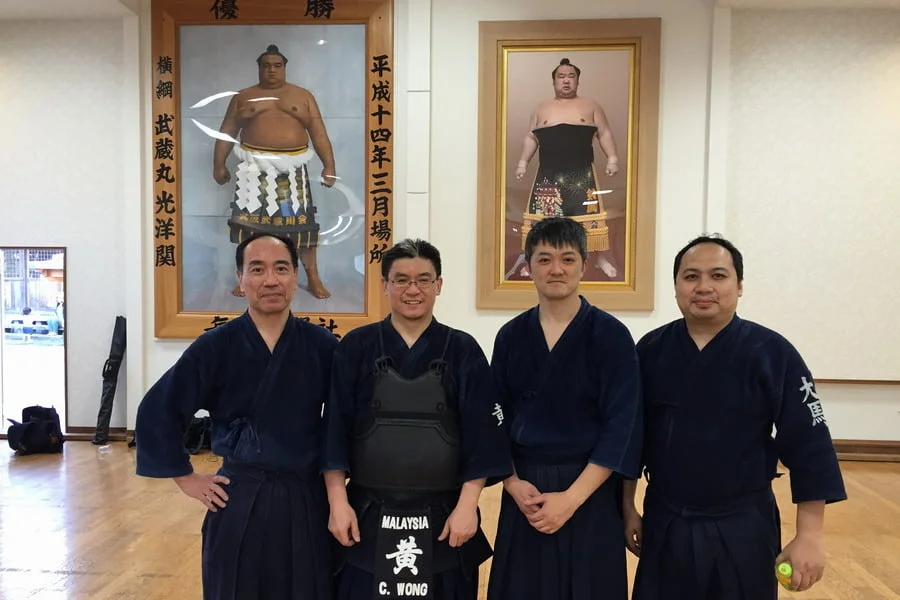 photo with a few Japanese senseis who used to train with Wong in Malaysia