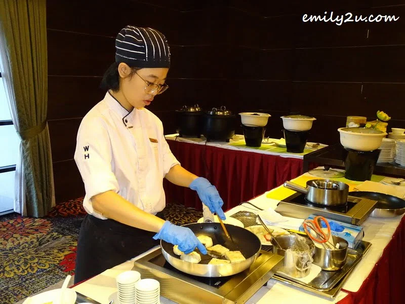 a chef manning the action stall