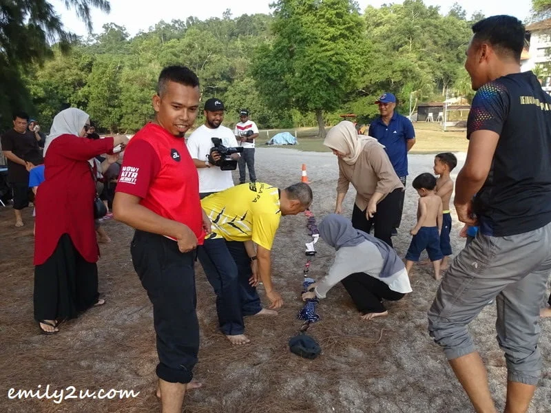 these two guys ready to contribute their tops to make THE longest line