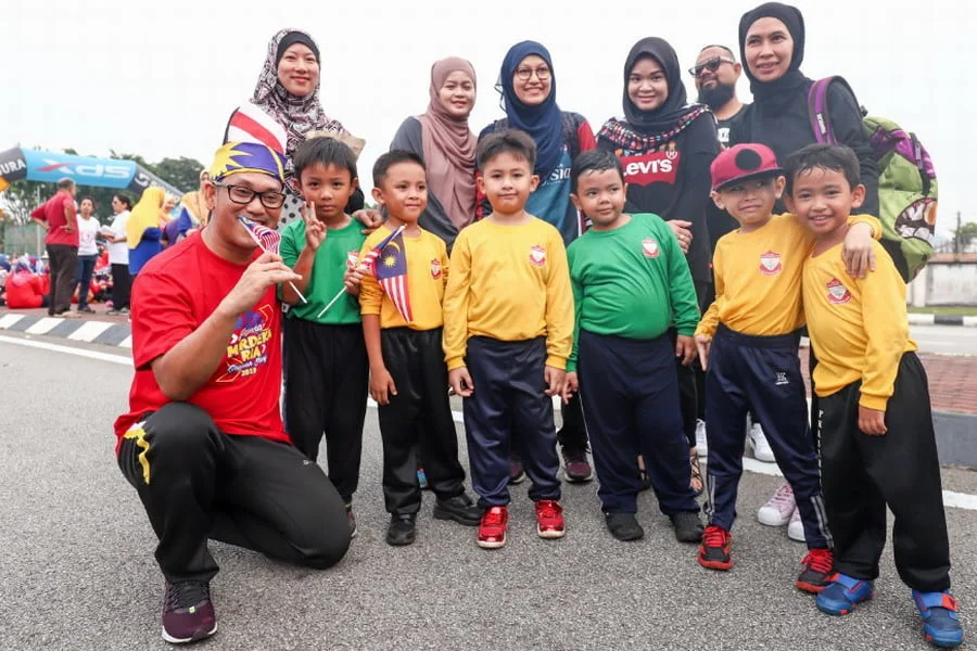 Perak Menteri Besar Dato' Seri Ahmad Faizal bin Azumu in red t-shirt