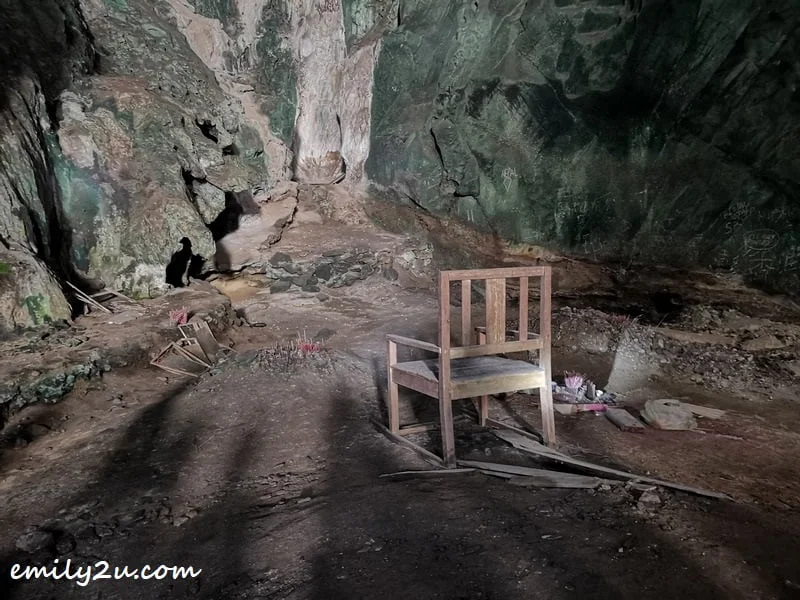 huge wooden chair that still faces the direction for Muslim prayer