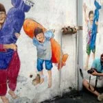 TV Man Can't Get Enough of Ipoh Eka photographs the wall murals