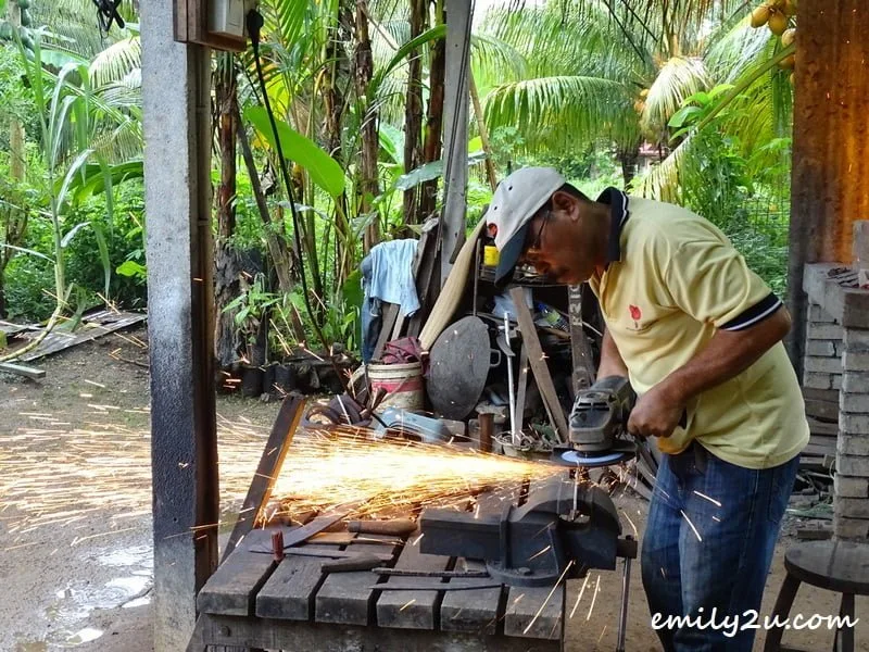 blacksmith shaping a knife