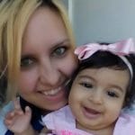 with daughter Scarlett Emery Love