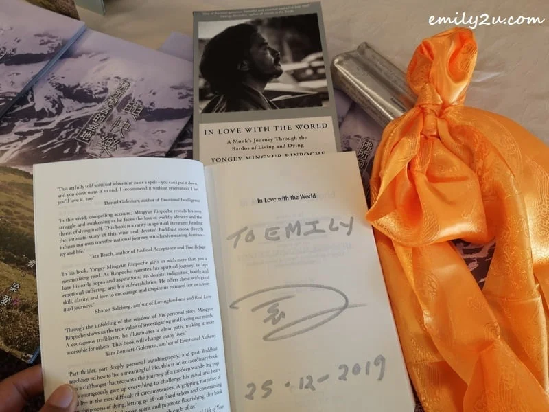 my autographed copy of In Love with the World: A Monk's Journey Through the Bardos of Living and Dying (by Yongey Mingyur Rinpoche)