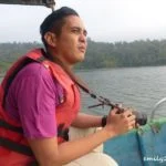 riding a speedboat on the way to Royal Belum