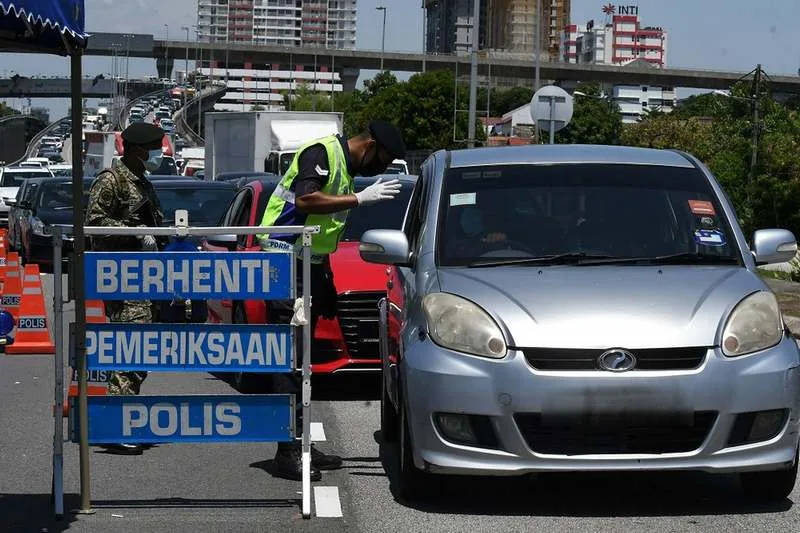 Road blocks in Selangor during the Conditional Movement Control Order (CMCO) to supervise people’s movement in curbing COVID-19.