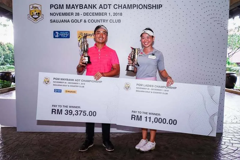 The winners of PGM ADT Maybank Championship 2018; Shinichi Mizuno (left) and Genevieve Ling at Saujana Golf & Country Club.
