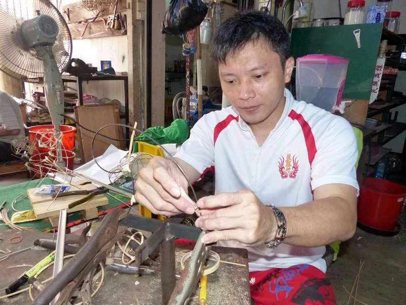 Indonesian Lao Yong Fu prepares the horn of the lion