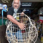 Master Siow Ho Phiew with his rattan-made lion head