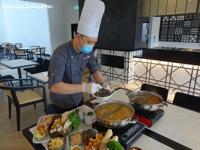 Executive Chef Chong Lih Chyi personally prepares the steamboat