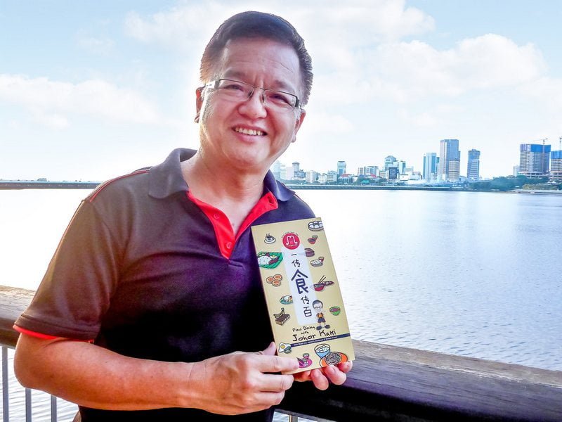 Boey with his book, Find Dining with Johor Kaki