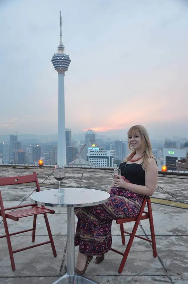 enjoying a view of KL Tower