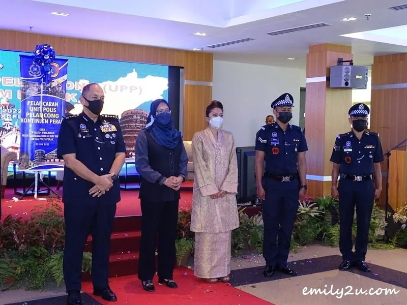 showing the official uniform that sets the Tourist Police apart from regular police