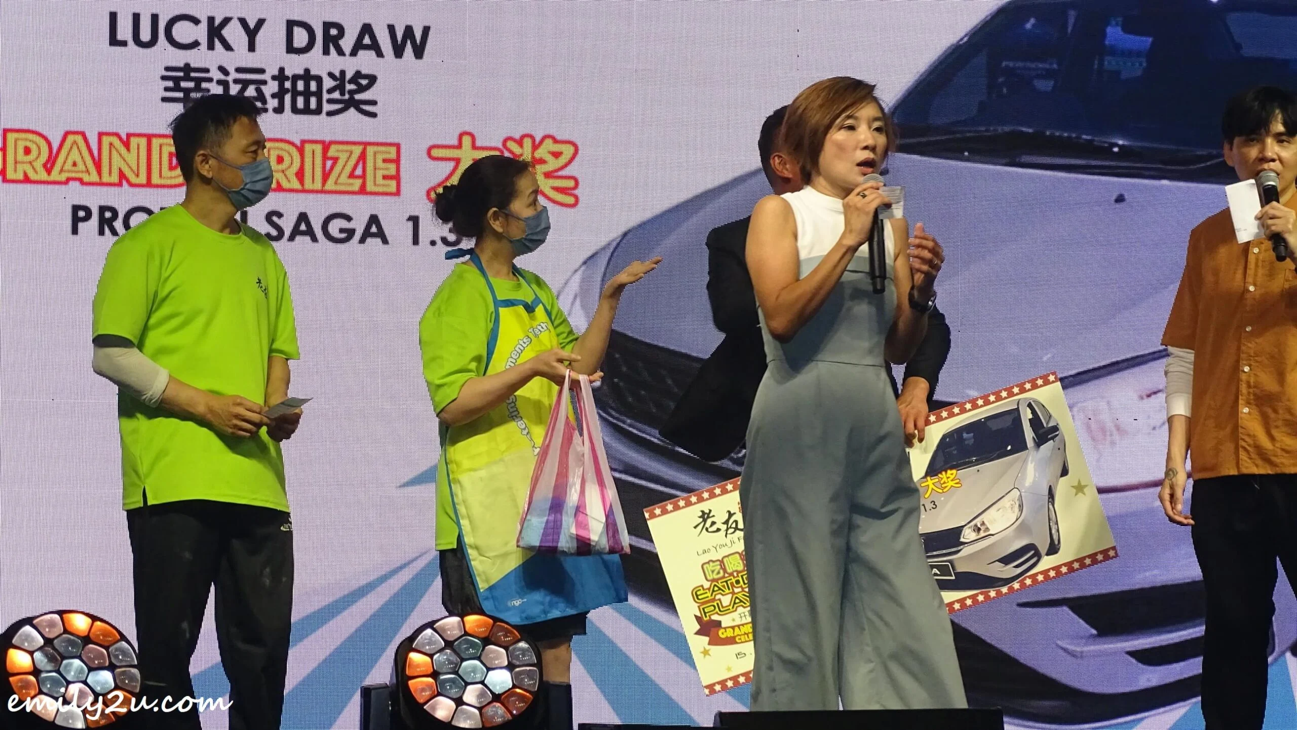 the couple with their large back of lucky draw entries, while waiting for their winning status to be verified