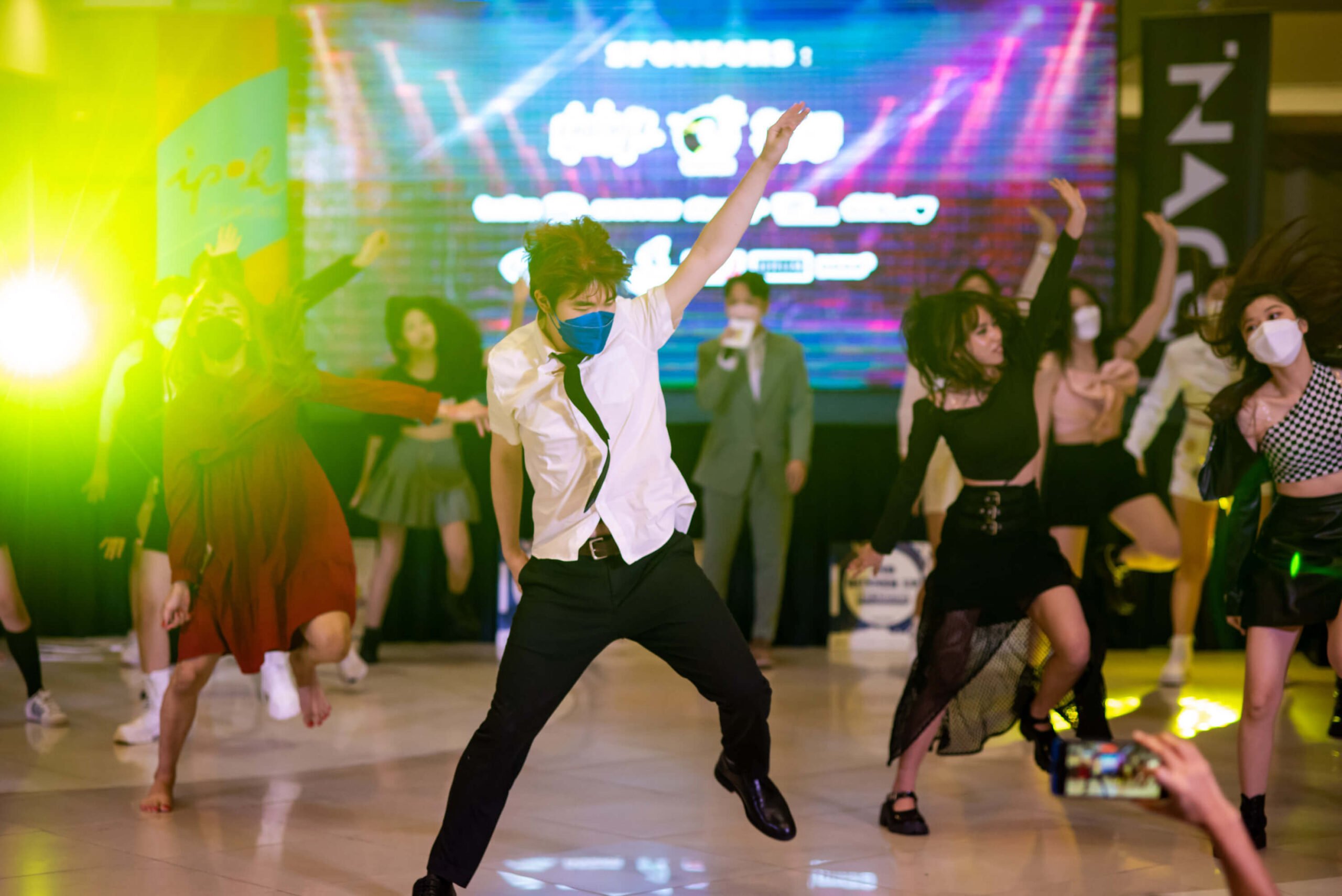 K-Pop Dance Cover participants grooving it out as they await the results