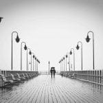 Photo by Pixabay: two people walking on pier