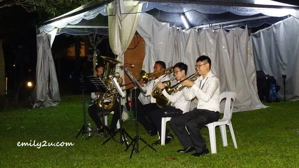 musicians are scattered around the property