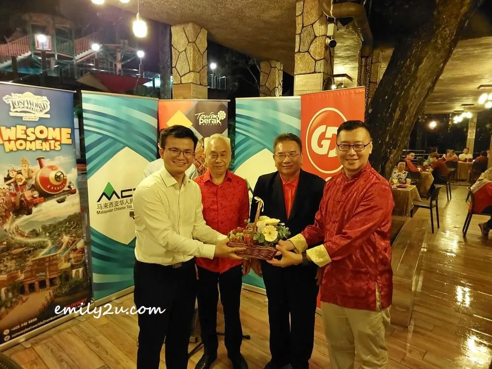 presenting a token of appreciation to YB Steven Tiw Tee Siang (State Assemblyperson for Tronoh)