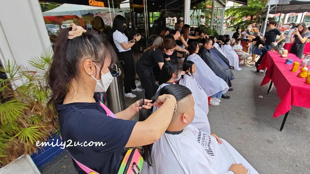 hair is being cut from the donors