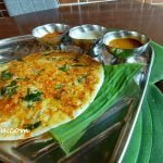 Othappam, also spelt Uttapam, is a mixture of tosai batter and rice batter with jintan spice, turmeric, chilli power, plus finely chopped carrots, onions and green chillies that add colour to the pancake. Served with Dhal, Coconut Chutney and Onion Chutney.