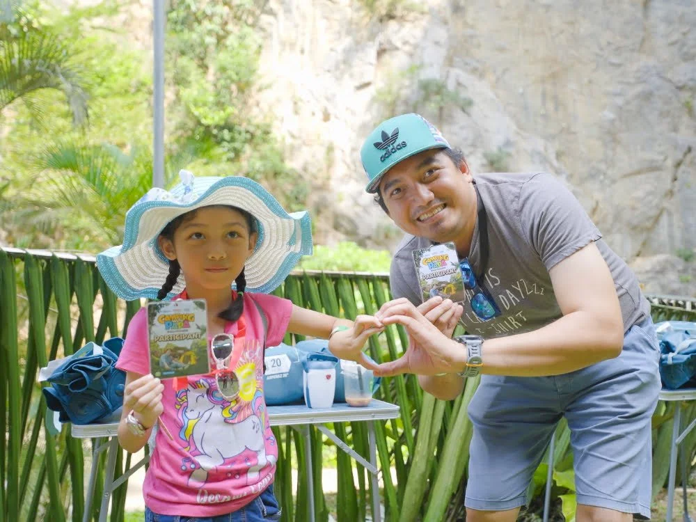 a dad and child show delight being selected for the exclusive Father's Day event