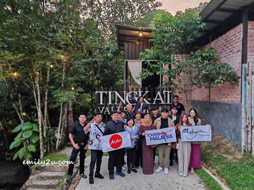 delegates from Bangkok and local guests pose in front of the Tingkat Valley signage