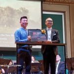 a special momento from the Selangor Symphony Youth Orchestra (SSYO) represented by Eugene Pook (R) to the Ipoh concert co-organiser, Soka Gakkai Malaysia (Perak)