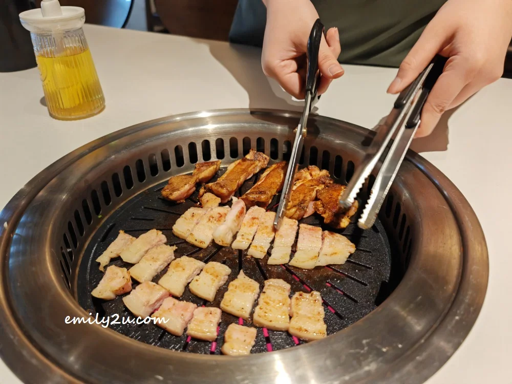 cutting the meat into smaller pieces