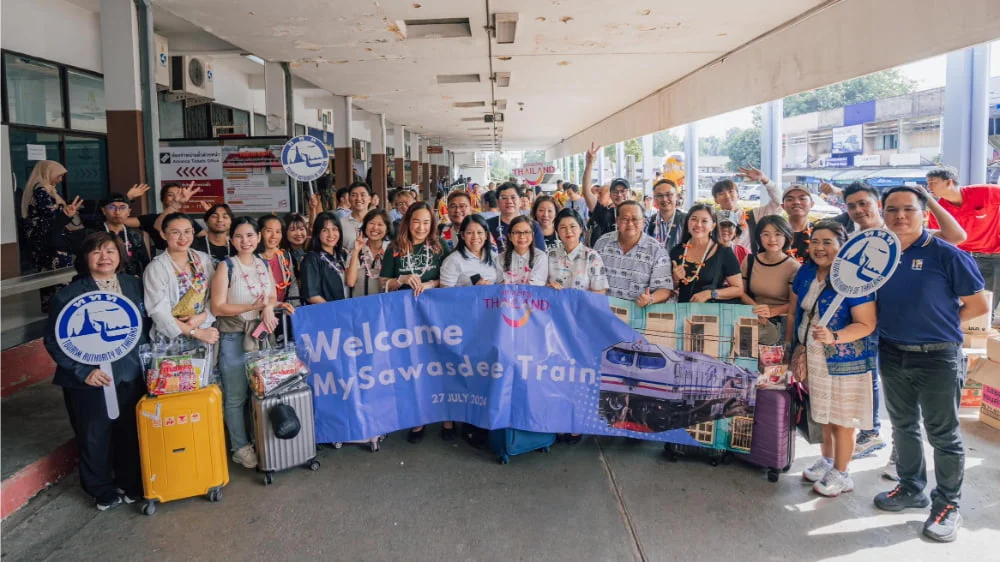 some of the passengers of Fortune Dragon Express pose for a group photo