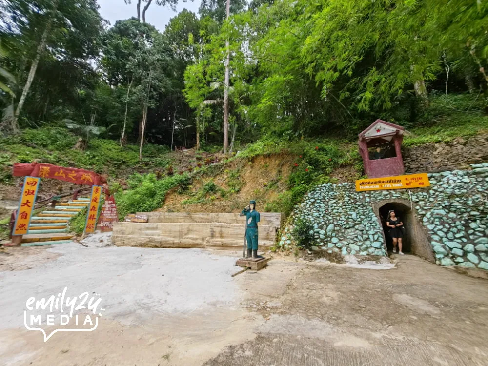 a visitor exits from the tunnel complex