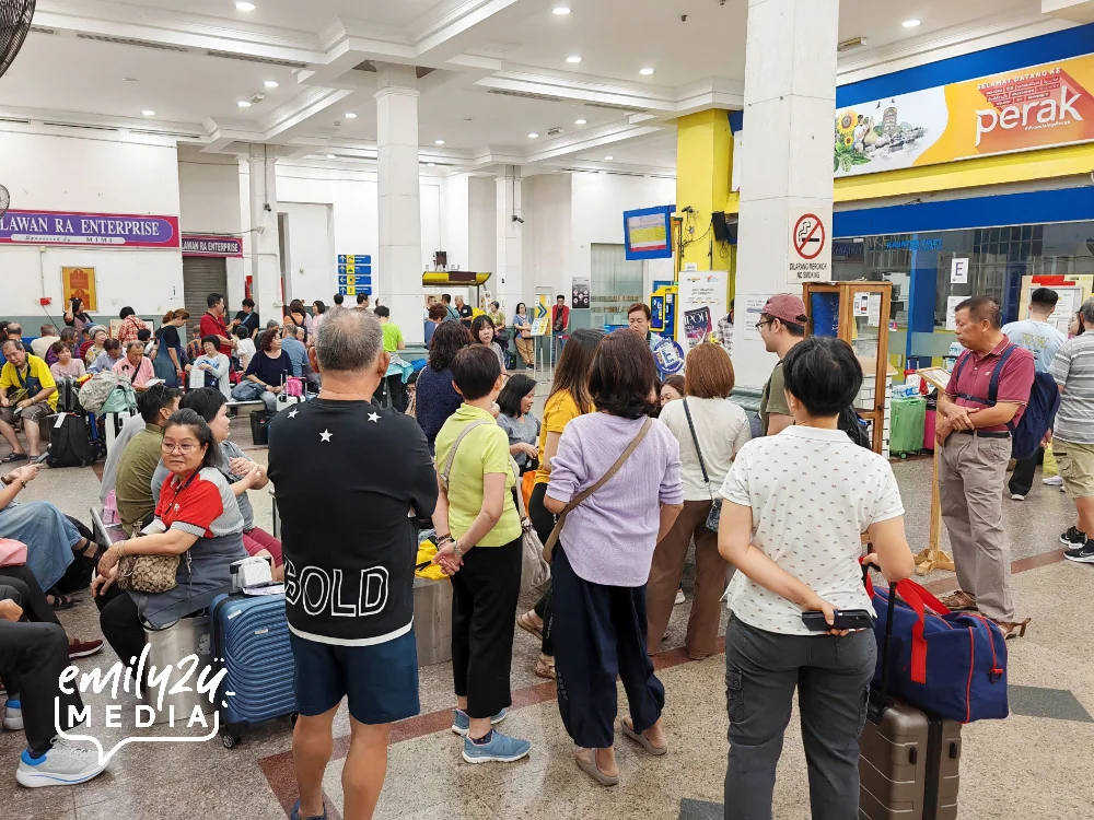 passengers at Ipoh Railway Station waiting for the Fortune Dragon Express from KL Sentral