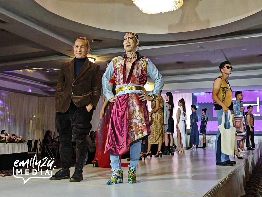 Gilbert Headhunter Borneo designer (L) with FashioniSTAR Francis Yip wearing Gilbert's upcycled creation