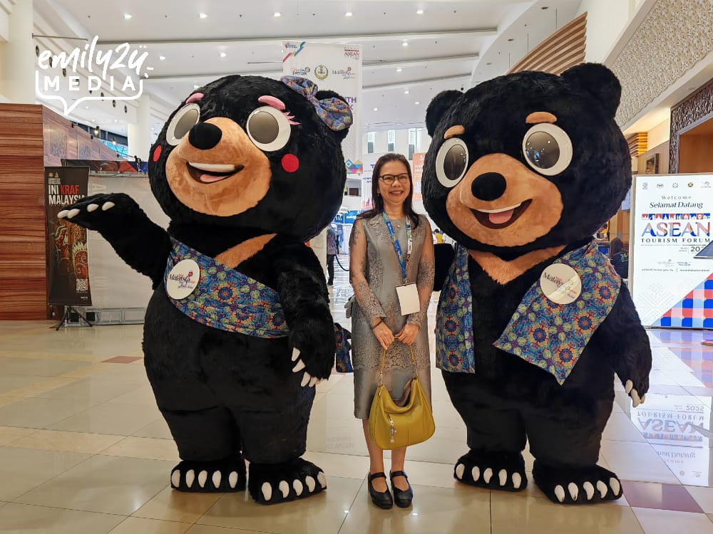 Ms. Sirinthara Surakanitaya, Director TAT KL, poses with Wira and Manja, the couple mascots for Visit Malaysia Year 2026. They are the Malayan sunbears