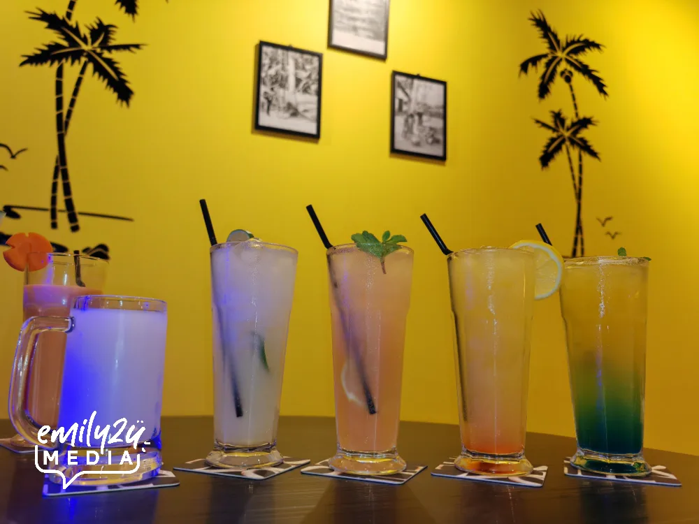 Signature Pebbles (R-L) Mango Glace, C'TA Blaster, Revfresh and Zenzero with a mug of original toddy