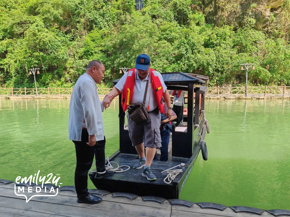 Mr Jimmy Goh, boss of Golden Century Tour & Travel Sdn. Bhd., is assisted off the Wupeng boat