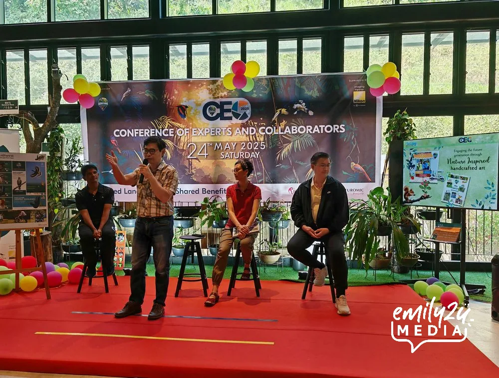 Quilljoy Endeavours' Chow presents while his wife Karen (in red top) listens in during Genting Nature Adventures Conference of Experts and Collaborators 2025 in May