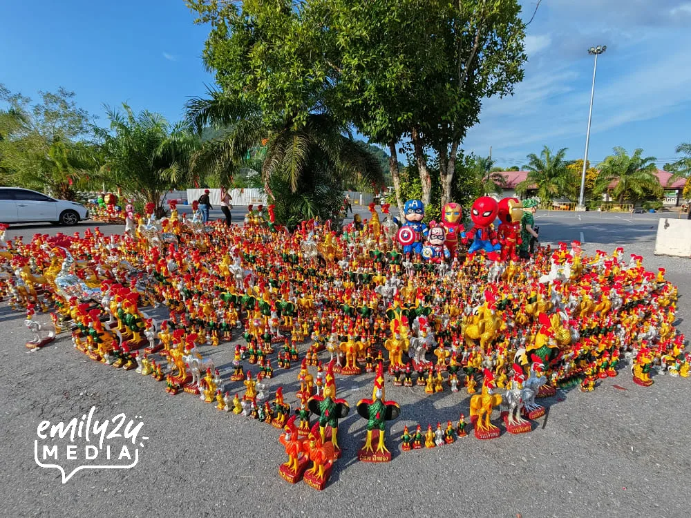 toys and many rooster figurines for Ai Khai
