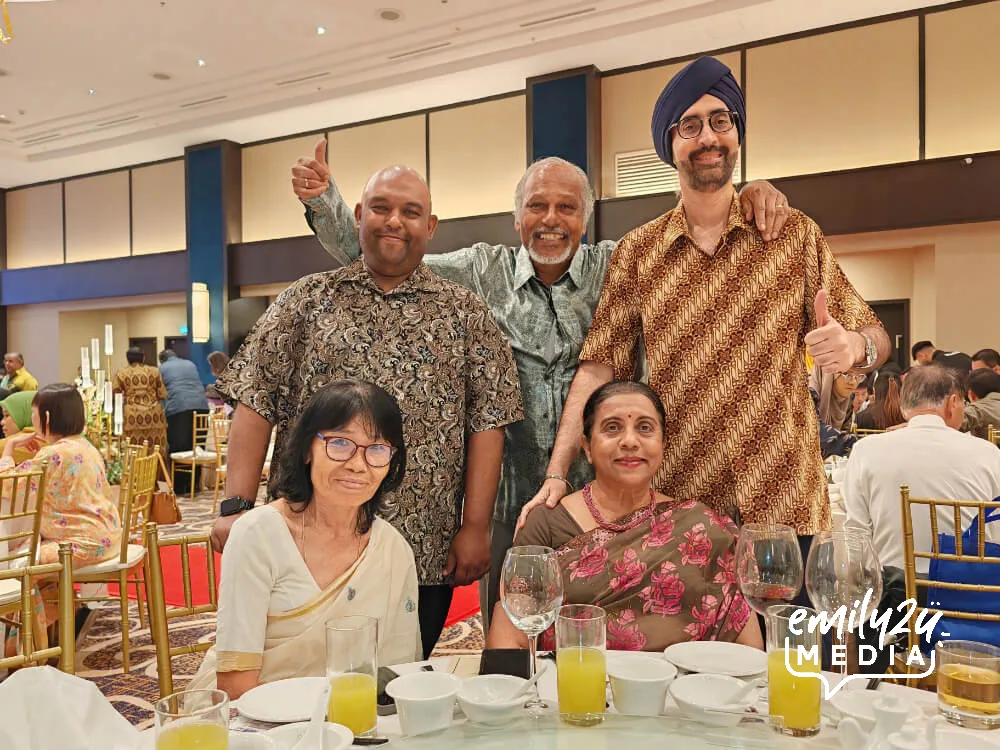 Dr. Mohamed Sidek (standing L) with his table mates