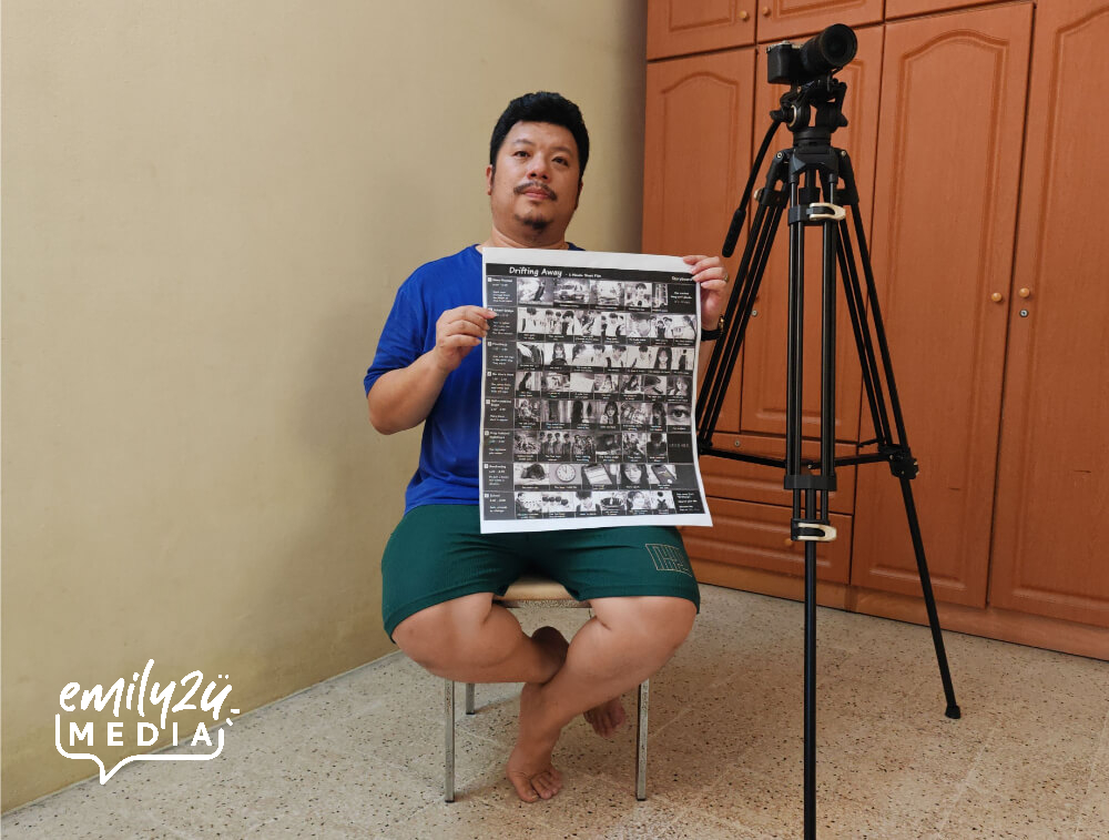 Drifting Away Director Richmond Than holds the storyboard