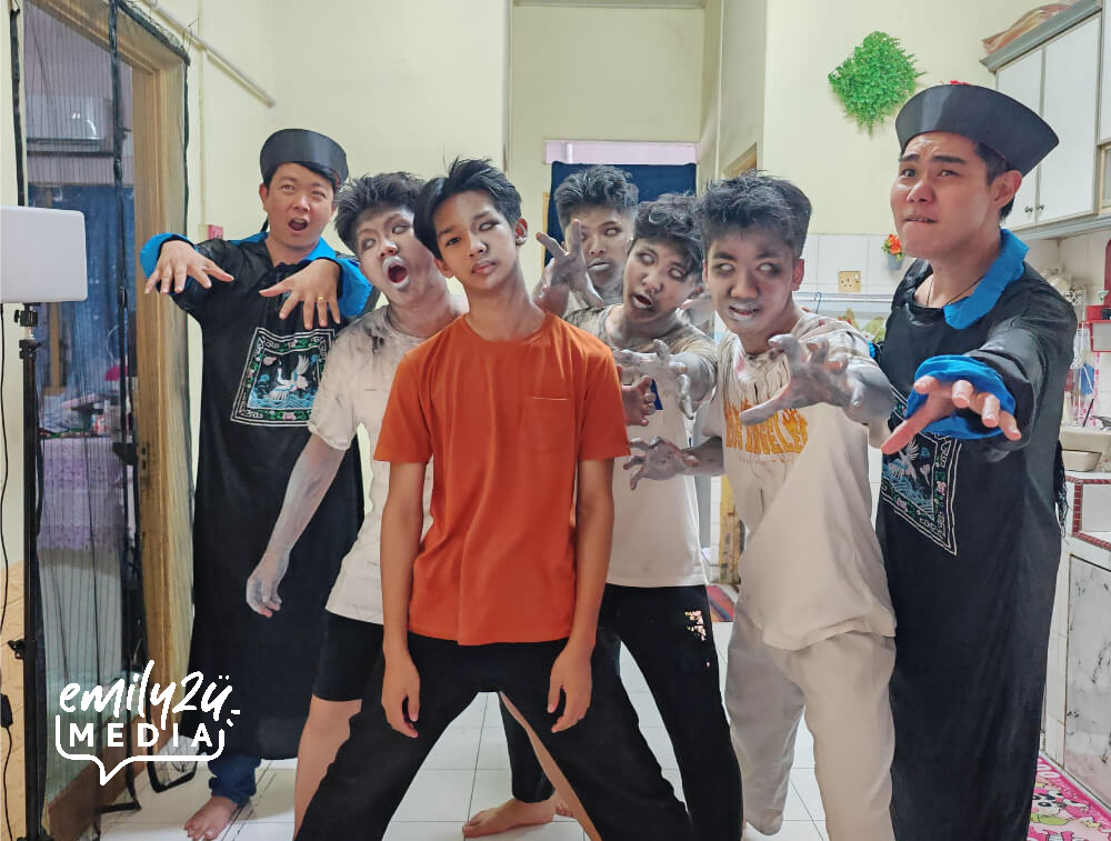 lead actor Addy Putera Chan (in orange t-shirt) with the devils